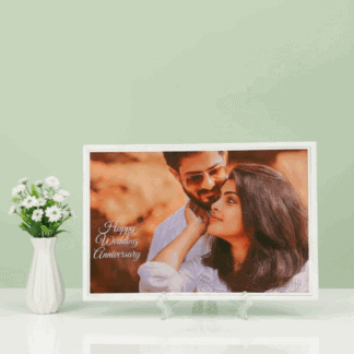Personalized anniversary photo tile with couple image and "Happy Wedding Anniversary" message.